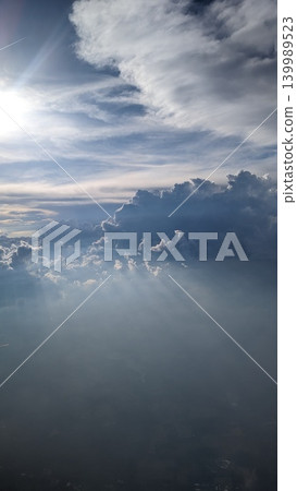 Sunrise clouds and Dublin rooftops viewed from airplane window Sunrise clouds and Dublin rooftops viewed from airplane window 139989523