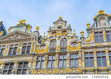 Baroque facades with ornate golden details on Grand-Place (Grote Markt) in Brussels, Belgium. Traveling through Europe. Bruxelles capital city sightseeing. La Brouette, Le Sac, La Louve guild houses Baroque facades with ornate golden details on Grand-Place (Grote Markt) in Brussels, Belgium. Traveling through Europe. Bruxelles capital city sightseeing. La Brouette, Le Sac, La Louve guild houses 139989558