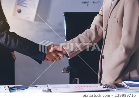 Accountants processing financial documents and taxes, managing corporate finance in a modern office. Audit and taxes in business Accountants processing financial documents and taxes, managing corporate finance in a modern office. Audit and taxes in business 139989710