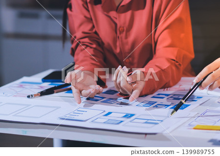 team of UI UX web designer are working together to develop mobile responsive websites with UI UX front end designer previews team of UI UX web designer are working together to develop mobile responsive websites with UI UX front end designer previews 139989755