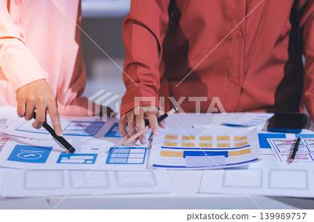 team of UI UX web designer are working together to develop mobile responsive websites with UI UX front end designer previews team of UI UX web designer are working together to develop mobile responsive websites with UI UX front end designer previews 139989757