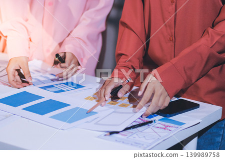team of UI UX web designer are working together to develop mobile responsive websites with UI UX front end designer previews team of UI UX web designer are working together to develop mobile responsive websites with UI UX front end designer previews 139989758