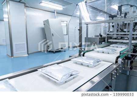 Automated packaging line in a sterile cleanroom environment for product manufacturing Automated packaging line in a sterile cleanroom environment for product manufacturing 139990033