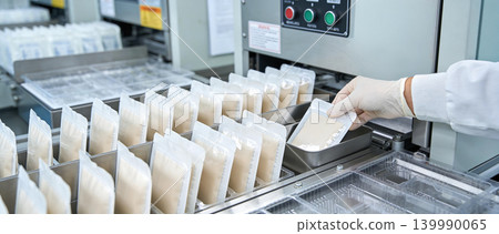 Automated packaging line in a sterile laboratory environment for pharmaceutical products Automated packaging line in a sterile laboratory environment for pharmaceutical products 139990065