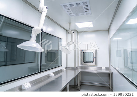 Modern cleanroom laboratory with stainless steel benches and fume hoods Modern cleanroom laboratory with stainless steel benches and fume hoods 139990221