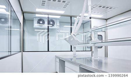 Modern laboratory cleanroom with stainless steel workbench and ventilation system Modern laboratory cleanroom with stainless steel workbench and ventilation system 139990264