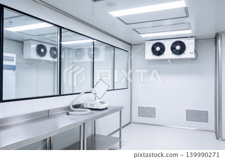 Cleanroom laboratory with stainless steel table and scientific equipment Cleanroom laboratory with stainless steel table and scientific equipment 139990271