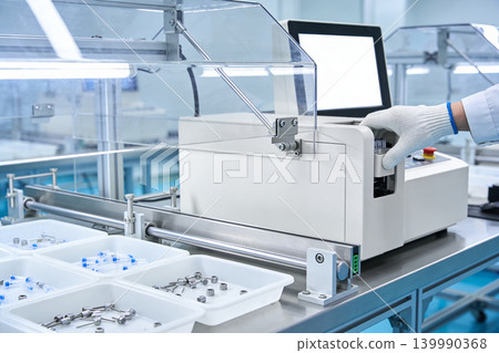 Automated medical device assembly line with sterile syringes and components Automated medical device assembly line with sterile syringes and components 139990368