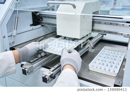 Automated precision assembly of small electronic components in a cleanroom environment 139990411