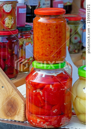 Preserved vegetables sold in jars on market Preserved vegetables sold in jars on market 139991871