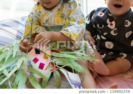 Children making Tanabata decorations Children making Tanabata decorations 139992259