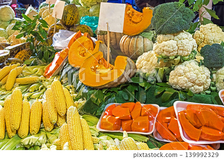 Vegetables and cut pumpkin on market Vegetables and cut pumpkin on market 139992329