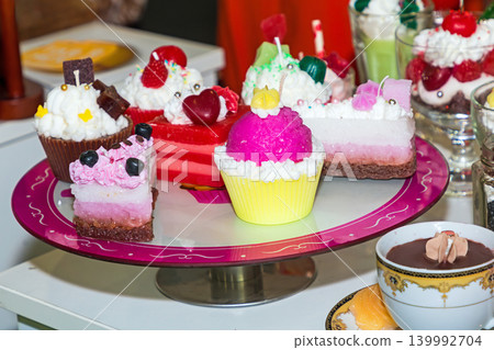 Cakes on a plate in cafe Cakes on a plate in cafe 139992704