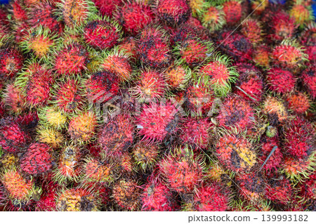 Rambutan sold in a Thai market Rambutan sold in a Thai market 139993182