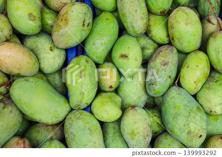 Mangoes sold in a Thai market Mangoes sold in a Thai market 139993292