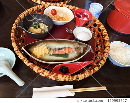 An elegant Japanese breakfast beautifully presented in a bamboo basket. An elegant Japanese breakfast beautifully presented in a bamboo basket. 139993827