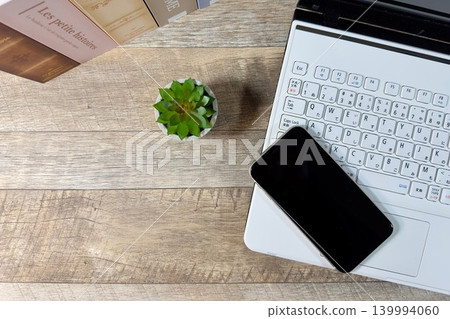 Home workspace and smartphone Home workspace and smartphone 139994060