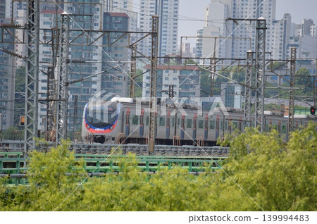 A subway train on Line 1 crossing the Han River Bridge in South Korea. A subway train on Line 1 crossing the Han River Bridge in South Korea. 139994483