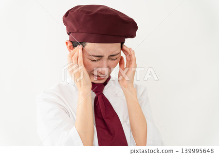 一位身穿麵包師制服的女子 一位身穿麵包師制服的女子 139995648