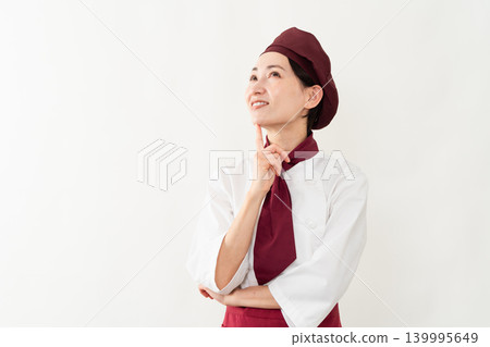 一位身穿麵包師制服的女子 一位身穿麵包師制服的女子 139995649