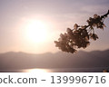 Sunset, mountain range, and cherry blossoms 139996716