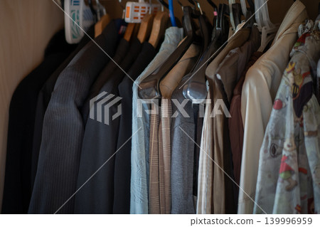 Clothes lying dormant in the closet at home, just taking up space in the drawers. Clothes lying dormant in the closet at home, just taking up space in the drawers. 139996959