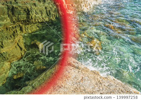 Split view of Malta coastline with ND filter example, showing the effect of neutral density filter 139997258