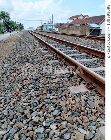 photo of railroad tracks with gravel rocks photo of railroad tracks with gravel rocks 139998098