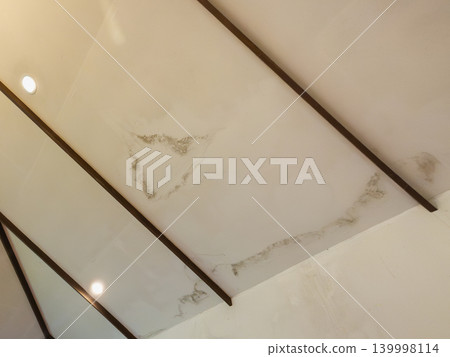Roof leak cause Ceiling stain, Ceiling water damage. 139998114