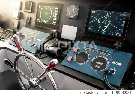 Digital dashboard with navigation system, marine radar and VHF Radio in ship captain bridge Digital dashboard with navigation system, marine radar and VHF Radio in ship captain bridge 139998981