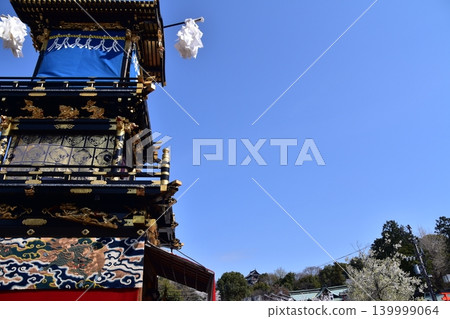 Inuyama Festival in Aichi Prefecture, Japan: The magnificent keep of Inuyama Castle and the floats gathered in front of the castle plaza, a scene before the dedication of the mechanical puppets. Inuyama Festival in Aichi Prefecture, Japan: The magnificent keep of Inuyama Castle and the floats gathered in front of the castle plaza, a scene before the dedication of the mechanical puppets. 139999064