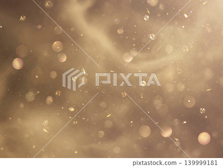 A background with shimmering gold particles and soft, airy white space. 139999181