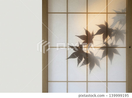 A Japanese-style background image featuring the silhouette of maple leaves reflected on a shoji screen and soft sunlight. A Japanese-style background image featuring the silhouette of maple leaves reflected on a shoji screen and soft sunlight. 139999195