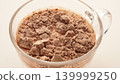 Close Up Chocolate Whey Protein Powder In Milk Before Mixing, Sports Nutrition And Supplement Drink Preparation Concept 139999250