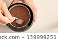 Top View Male Hands Scooping Chocolate Whey Protein Powder From Container, Fitness Nutrition And Supplement Routine Concept 139999251