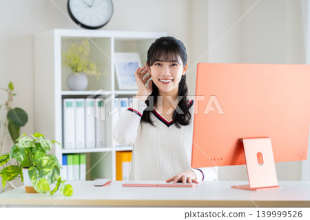 Young designer working in the office 139999526