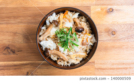 Photo of Japanese-style mixed rice with sea bream, mushrooms, and perilla leaves. Photo of Japanese-style mixed rice with sea bream, mushrooms, and perilla leaves. 140000509