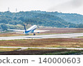 A large passenger plane landing 140000603