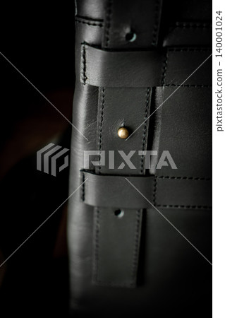 Fashionable mens bag, men purse, wallet men's casual outfits with leather accessories, brown bag on wooden board background Fashionable mens bag, men purse, wallet men's casual outfits with leather accessories, brown bag on wooden board background 140001024