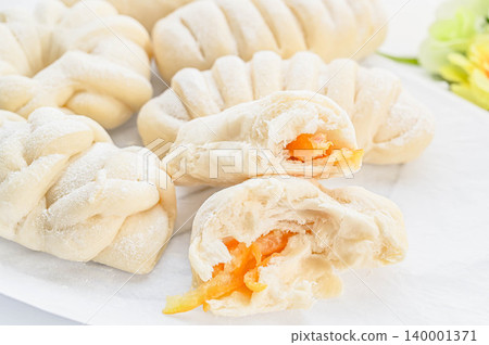 Freshly baked homemade white bread with marmalade Freshly baked homemade white bread with marmalade 140001371