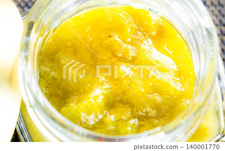Green plums that have been soaked in plum wine are then simmered in syrup, mashed, and made into plum jam. Green plums that have been soaked in plum wine are then simmered in syrup, mashed, and made into plum jam. 140001770