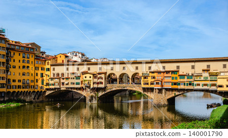 Ponte Vecchio bridge over Arno river in Florence, Italy 140001790