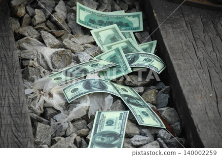 American Dollars on a Train Track American Dollars on a Train Track 140002259