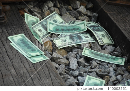 American Dollars on a Train Track 140002261