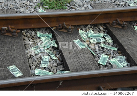 American Dollars on a Train Track American Dollars on a Train Track 140002267