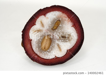 Thai mangosteen photographed against a white background Thai mangosteen photographed against a white background 140002461
