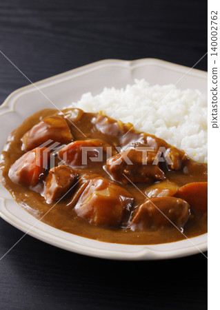 Curry rice with plenty of chunky vegetables Curry rice with plenty of chunky vegetables 140002762