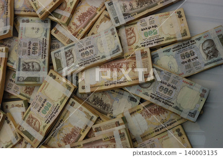 Indian Old Currency in a Studio Indian Old Currency in a Studio 140003135
