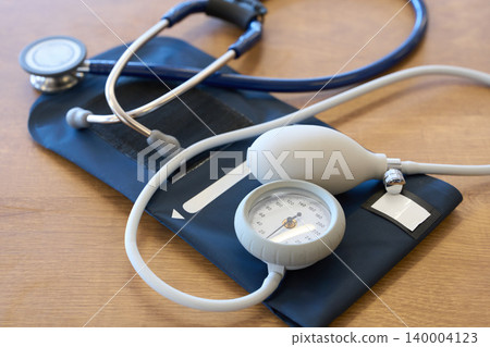 Aneroid sphygmomanometer and stethoscope in a nursing home Aneroid sphygmomanometer and stethoscope in a nursing home 140004123