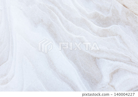 Soft white snowdrift with sand with delicate ripple patterns Soft white snowdrift with sand with delicate ripple patterns 140004227